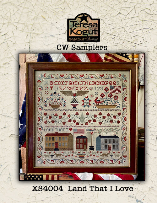 Cross-stitched sampler with decorative elements and 'Teresa Kogut' branding on a textured background.