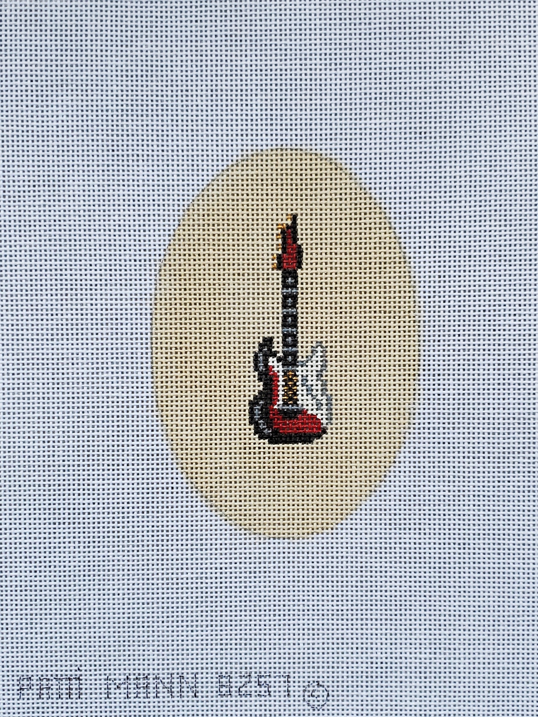 Patti Mann Needlepoint Red/White/Black Bass Guitar Ornament 
8257