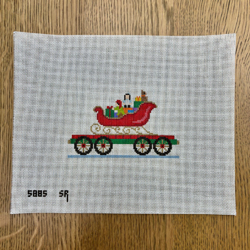Susan Roberts Needlepoint Holdings 
5885 NP Express Sleigh